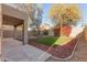 Artificial turf backyard with flagstone patio and covered area at 30417 N 42Nd Pl, Cave Creek, AZ 85331