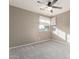 Bright bedroom with ceiling fan, window coverings, and carpet at 30417 N 42Nd Pl, Cave Creek, AZ 85331