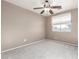 Well-lit bedroom featuring a ceiling fan and window coverings at 30417 N 42Nd Pl, Cave Creek, AZ 85331