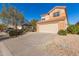 Two-story house with attached garage and driveway at 30417 N 42Nd Pl, Cave Creek, AZ 85331