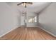 Bright living room with hardwood floors and neutral walls at 30768 N Royal Oak Way, San Tan Valley, AZ 85143