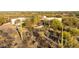 Luxury home nestled in the desert landscape with saguaro cacti at 35931 N 82Nd Pl, Scottsdale, AZ 85266