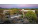 Aerial view of a stucco home with desert landscaping at 35931 N 82Nd Pl, Scottsdale, AZ 85266