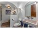 Spa-like bathroom with a stone sink, modern fixtures, and a relaxing atmosphere at 35931 N 82Nd Pl, Scottsdale, AZ 85266