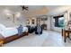 Main bedroom with plush carpet, a large window, and seating area at 35931 N 82Nd Pl, Scottsdale, AZ 85266
