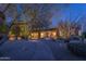 Night view of home exterior with lighting and pathway at 35931 N 82Nd Pl, Scottsdale, AZ 85266