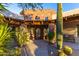 Spanish style home with courtyard entry and fountain at 35931 N 82Nd Pl, Scottsdale, AZ 85266