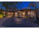 Night view of home exterior with fountain at 35931 N 82Nd Pl, Scottsdale, AZ 85266