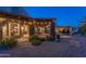 Night view of a charming patio with lighting and landscaping at 35931 N 82Nd Pl, Scottsdale, AZ 85266