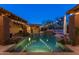 Inviting pool and spa area with lights, perfect for nighttime entertaining at 35931 N 82Nd Pl, Scottsdale, AZ 85266