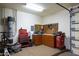 Organized workshop area in the garage, complete with tools and workbench at 35931 N 82Nd Pl, Scottsdale, AZ 85266