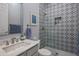 Modern bathroom with patterned tile shower at 3655 E Louise Dr, Phoenix, AZ 85050