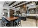 Spacious kitchen featuring dark wood cabinets and an island at 4362 N Diamond Point Cir, Mesa, AZ 85207