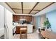 Galley kitchen with wood cabinets and a tiled floor at 4529 W Columbine Dr, Glendale, AZ 85304