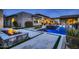 Luxury backyard oasis featuring a pool, spa, and fire pit at 13454 N Stone View Trl, Fountain Hills, AZ 85268