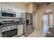 Kitchen with stainless steel appliances and granite counters at 1428 S Roanoke --, Mesa, AZ 85206