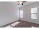 Spacious bedroom with plush carpeting and ample natural light at 19749 W Harrison St, Buckeye, AZ 85326