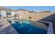 Clean rectangular pool with large patio area at 22915 E Quintero Rd, Queen Creek, AZ 85142