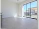 Bright bonus room with sliding glass doors leading to backyard at 28409 N 59Th Way, Cave Creek, AZ 85331