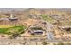 Expansive aerial view of a luxury home bordering a golf course in a desert community at 3703 S Avenida De Angeles --, Gold Canyon, AZ 85118