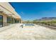 Backyard showcasing spa, desert landscaping, and covered patio with ceiling fans at 3703 S Avenida De Angeles --, Gold Canyon, AZ 85118