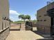 Golf course view from backyard with stone-accented walls and exterior staircase at 3703 S Avenida De Angeles --, Gold Canyon, AZ 85118