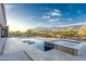 The pristine pool and patio provide a stunning view of the desert landscape and majestic mountains at 3703 S Avenida De Angeles --, Gold Canyon, AZ 85118