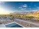 Backyard pool features a mountain view and desert landscaping, creating a serene outdoor living space at 3703 S Avenida De Angeles --, Gold Canyon, AZ 85118