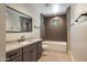 Bathroom showcases a shower/tub, and gray cabinets with a white marble countertop at 3703 S Avenida De Angeles --, Gold Canyon, AZ 85118