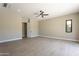 Spacious bedroom with recessed lighting, wood-look tile flooring, and a bright window at 3703 S Avenida De Angeles --, Gold Canyon, AZ 85118