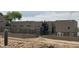 Exterior view of a modern home featuring a spiral staircase, neutral color palette and iron fence at 3703 S Avenida De Angeles --, Gold Canyon, AZ 85118