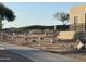 View of an exterior and surrounding golf course with native plants and desert landscaping with walking path at 3703 S Avenida De Angeles --, Gold Canyon, AZ 85118