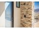 Stylish outdoor shower with stone accent wall, modern fixtures, and a glass door enhancing its upscale appeal at 3703 S Avenida De Angeles --, Gold Canyon, AZ 85118