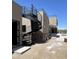 Exterior with a stone accent and a unique spiral staircase leading to the rooftop with neighborhood views at 3703 S Avenida De Angeles --, Gold Canyon, AZ 85118