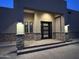 Inviting front entrance featuring a modern door and stacked stone accents at 3703 S Avenida De Angeles --, Gold Canyon, AZ 85118