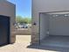 Spacious garage with ample storage, complemented by a stylish brick driveway and modern exterior lighting at 3703 S Avenida De Angeles --, Gold Canyon, AZ 85118