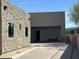 Spacious garage with an open door and stone accents matching the house exterior at 3703 S Avenida De Angeles --, Gold Canyon, AZ 85118