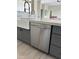 Kitchen island with farm sink and stainless steel dishwasher at 3703 S Avenida De Angeles --, Gold Canyon, AZ 85118