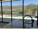 Modern kitchen sink and countertops overlooking the pool and mountain views beyond at 3703 S Avenida De Angeles --, Gold Canyon, AZ 85118
