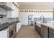 Gourmet kitchen with stainless steel appliances, expansive counters, and custom cabinetry at 3703 S Avenida De Angeles --, Gold Canyon, AZ 85118