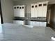 Modern kitchen with white cabinets and quartz countertops at 3703 S Avenida De Angeles --, Gold Canyon, AZ 85118