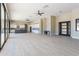 Spacious living area with modern open plan, featuring tile flooring and a gourmet kitchen at 3703 S Avenida De Angeles --, Gold Canyon, AZ 85118