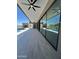 Inviting patio with ceiling fans overlooking a sparkling pool, landscaping, and desert views at 3703 S Avenida De Angeles --, Gold Canyon, AZ 85118