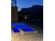 Elevated view of the pool and spa with mountain views at dusk at 3703 S Avenida De Angeles --, Gold Canyon, AZ 85118