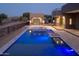 Relaxing backyard featuring a sparkling blue pool, spa and stone accents that enhance the outdoor living space at 3703 S Avenida De Angeles --, Gold Canyon, AZ 85118