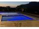 Beautiful pool and spa at dusk, featuring blue LED lighting at 3703 S Avenida De Angeles --, Gold Canyon, AZ 85118