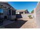 Spacious backyard with gravel landscaping and block wall at 5185 S Eileen Dr, Chandler, AZ 85248