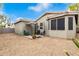 Private backyard patio with seating area and umbrella at 5185 S Eileen Dr, Chandler, AZ 85248