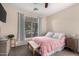 Spacious bedroom with large window and comfortable bedding at 5185 S Eileen Dr, Chandler, AZ 85248