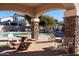 Community pool with covered patio and lounge chairs at 5185 S Eileen Dr, Chandler, AZ 85248